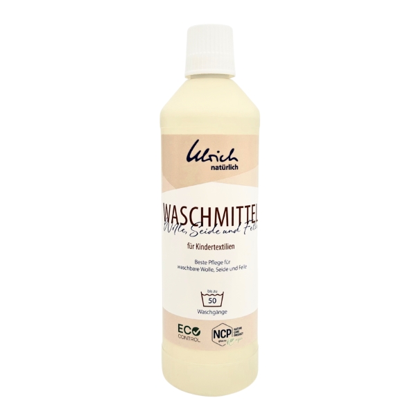 Eine Flasche mit dem Schriftzug Waschmittel für Kindertextilien